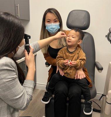 Our 1 yo patient getting his first eye exam and he did amazing! It's never too early for an eye exam.