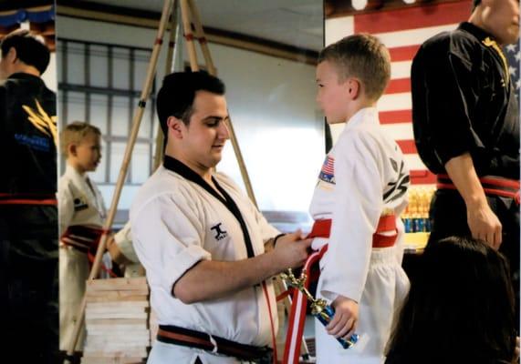 Students earn belts when they have demonstrated mastery of martial arts techniques.  It build self confidence and self respect.