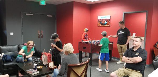 Party room with pinball and foosball and shuffleboard