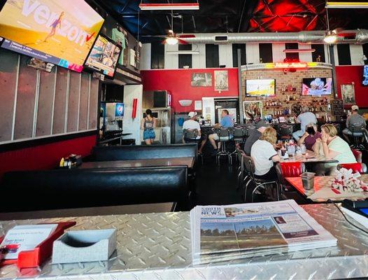 Indoor seating and front counter.