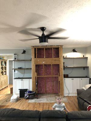 Custom cabinets and fireplace being built