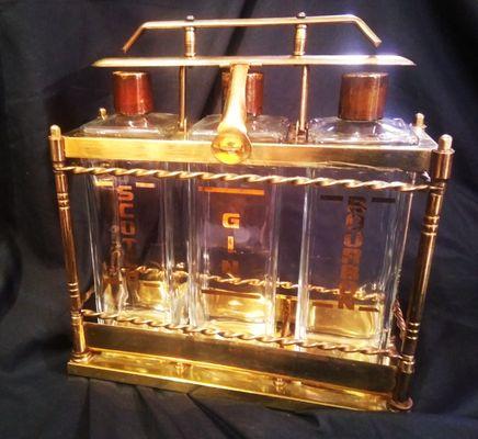 Stunning Tantalus in superior condition with original lock and decanters