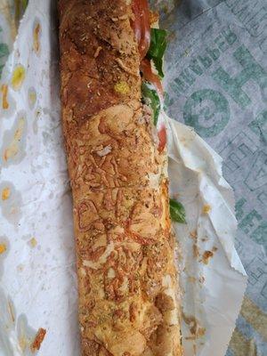 Foot long tuna. Most ingredients on one side. Laaaame and messy.