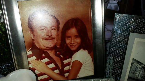 My belated father and me as a child.