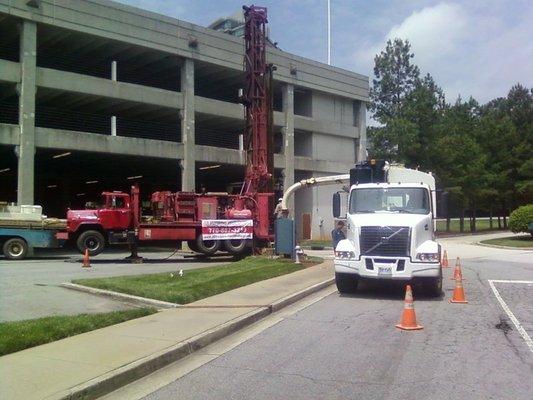 Drilling commercial well and using vac truck to haul off slurry from drilling in the Atlanta, Georgia area