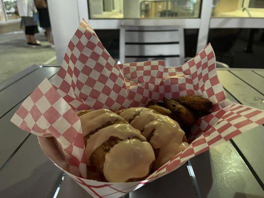 Beef empanadas with plantains, pink sauce on top 10/10 I ate everything and almost got more.