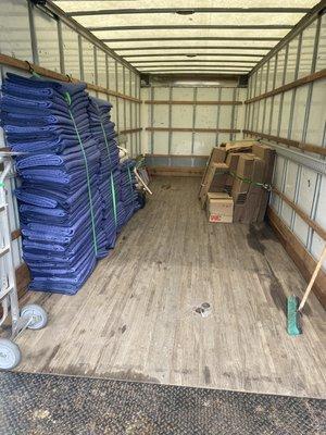 The inside of a freshly cleaned and prepped moving truck.