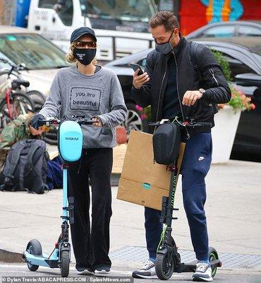 Paris Hilton and carter enjoy the day riding with vip scooters