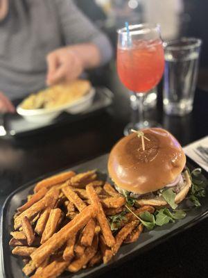 SIGNATURE SMASH BURGER, sweet potato fries, and a Amalfi Spritzer