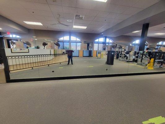 Mirror wall installation at a gym in EDH