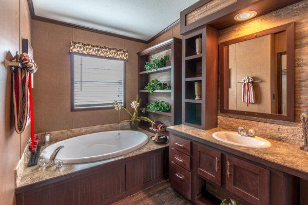 Lots of room and storage in these baths by Palm Harbor! Take this one or custom build one in your style!