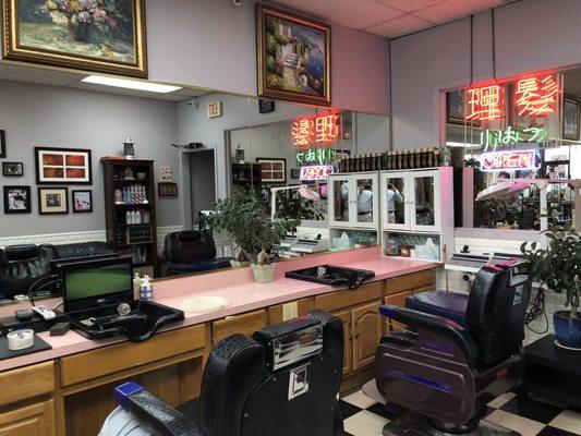 View of 2/4 of the barber stations, rather professional setup, full service equipment, fountain, &mini TVs, plus things for sale. (3/5/2018)