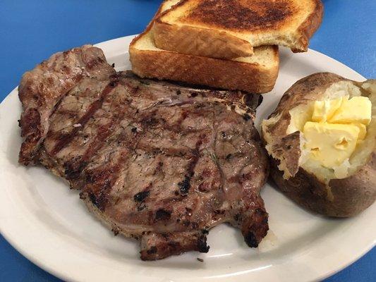 T-bone steak, medium well-done. Comes with a baked potato, buttered toast and salad.