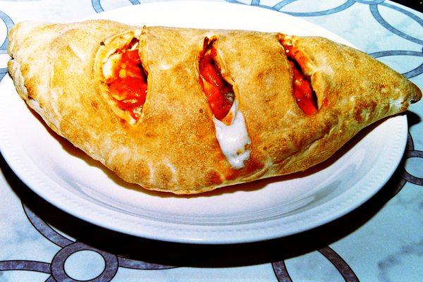 Small calzone with marinara sauce, ricotta, mozzarella and provolone cheese.