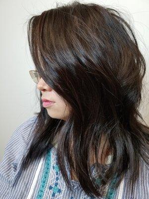 Textured haircut with lots of movement and volume.