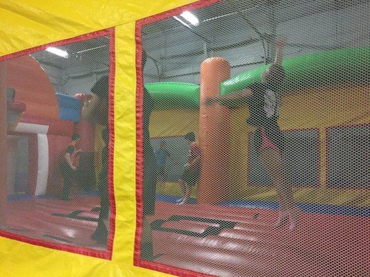 Bounce house with basketball hoop