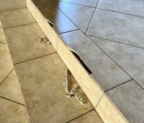 Damaged tiles caused by Costco delivery service, Innovel.