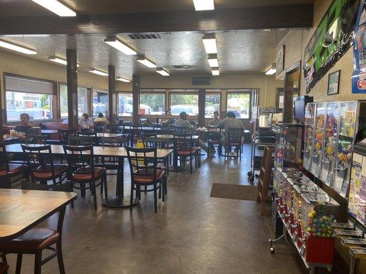 Nice indoor seating with row of Bubble Gum/ Prize machines for the kids !