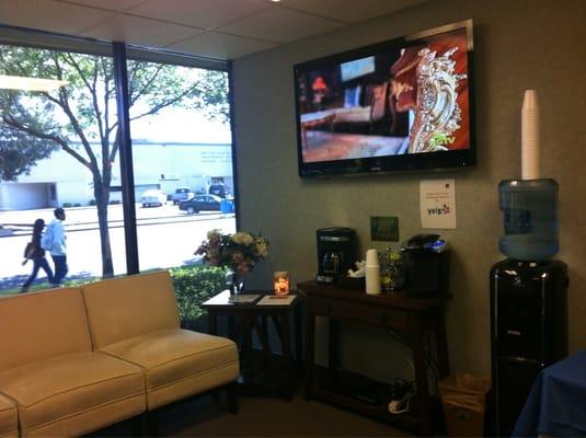 Tv and coffee/tea in waiting area