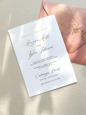 Foil stamped card stock invitation with foil stamped envelopes