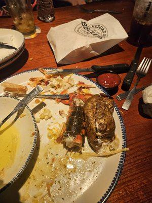 Lobster tail unseasoned and baked potato didn't even know they came that small