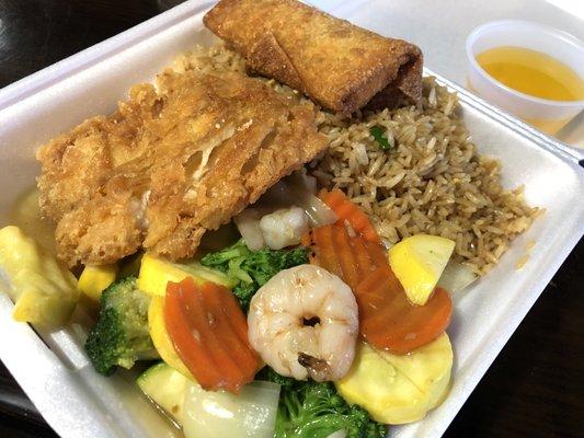 Lunch Deluxe Combo with Lemon Chicken & Stir Fry Shrimp. Rice, egg roll, soup & drink included for only $8.75.