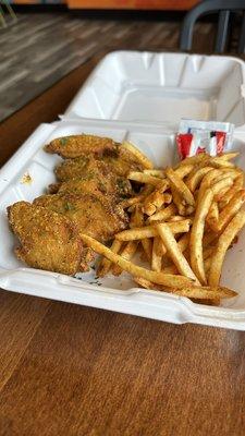 Lemon pepper flats with dry rub and fries.