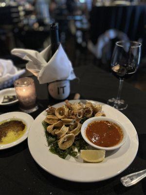 Calamari fritta atop flash-fried Spinach served with house-made spicy marinara