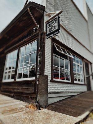 Store front on Lansing St. and Albion, across from the park.