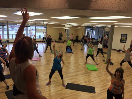 A stretch from the stage at Mission Jazzercise