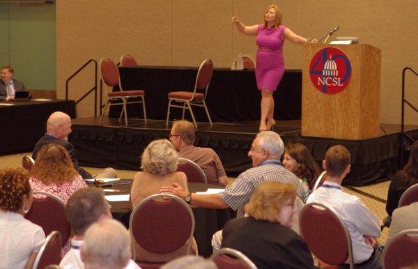 Sari providing a keynote address