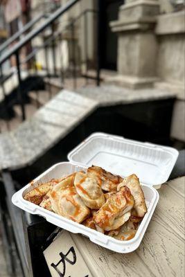 Pork and Chives Potstickers with hot sauce