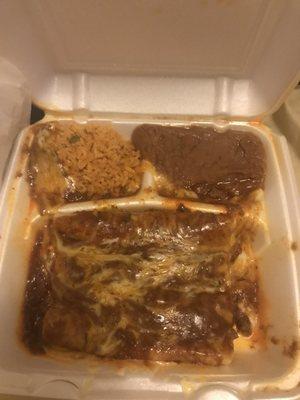 Beef enchiladas with red sauce.