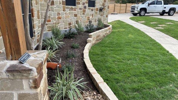 Low maintenance plants/ with chop block border