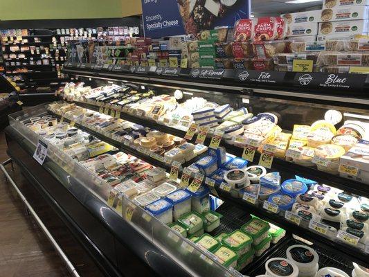 A well-stocked grab-and-go cheese and deli space.