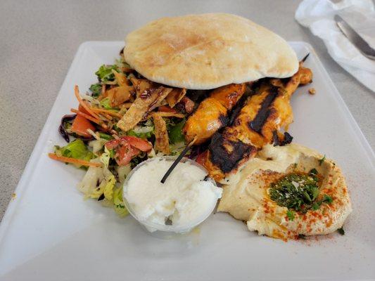 Shish Tawook platter with a fatoush salad. The hummus and fresh Lebanese (pita) bread were so good! I highly recommend this place!