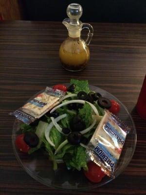 Salad included with the meal with house Italian dressing. No Kraft dressings here.