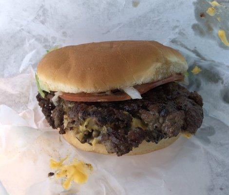 Look at that glorious slice of tomato! A double Mtn. Home burger. Lettuce, tomato, onion, cheese, and "smash sauce."