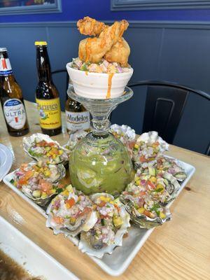 Their signature Mariscos plate with oysters