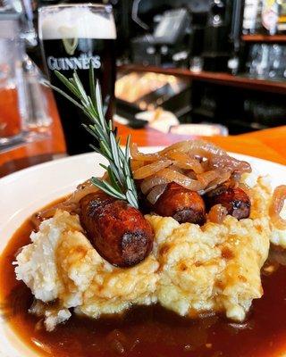 Bangers & mash with roasted onion gravy - magically delicious!!