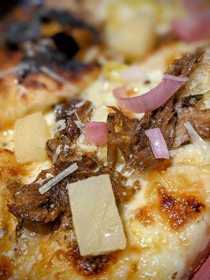 Luau pizza, with red onion, pulled pork and pineapple