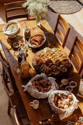 Mediterranean Chicken Gyros and Fresh Croissants Muffins and Sausages