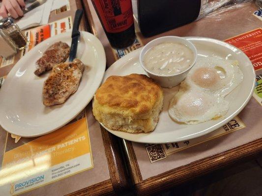 Biscuits and gravy with pork.