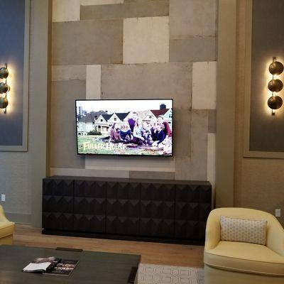 TV mounted on stone