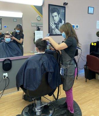 Men's haircut by a stylist at Proper Cuts hair salon