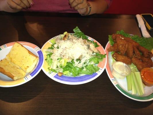 Garlic bread, Chicken  Caesar salad, breaded wings