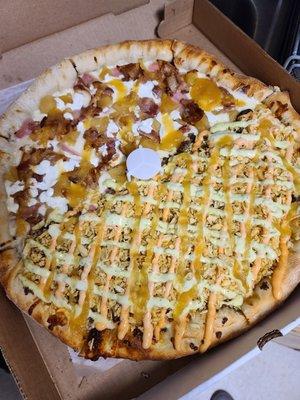 Half and half pizza - hawaiian de la casa (top) burger (bottom)