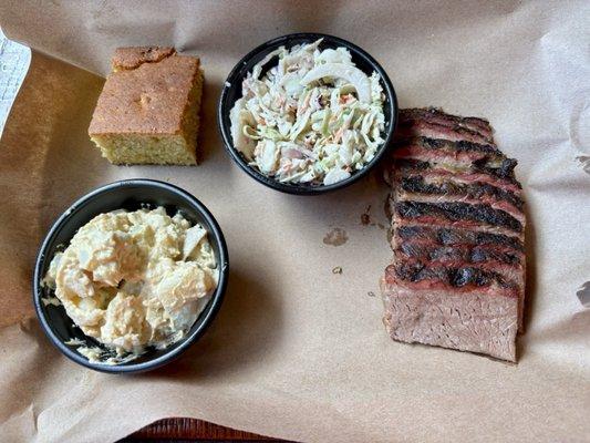 Lean brisket with cornbread, potato salad and cole slaw.