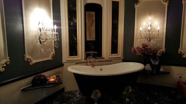 Custom clawfoot tub in homeowners bedroom