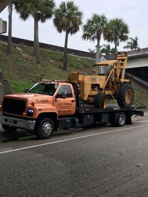 Tractor tow for a regular customer